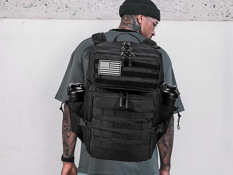 Black tactical backpack worn with shaker bottles in both side pockets
